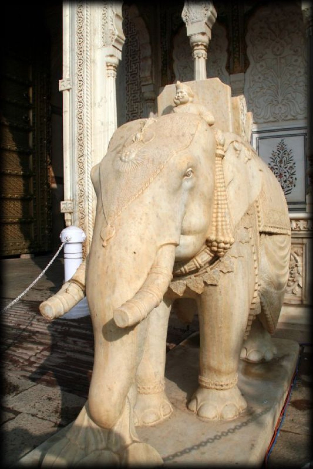 Marble elephants flanking the Rajendra Gate.